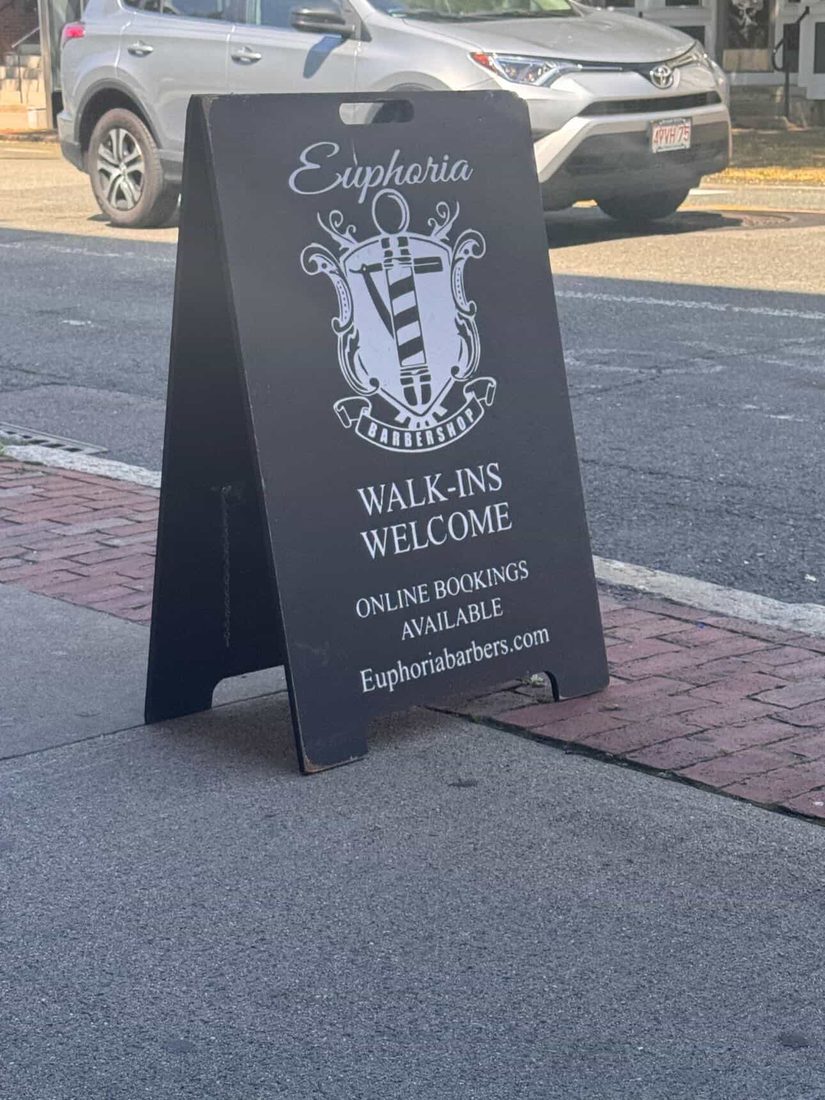 Storefront sign — Euphoria Barbershop
